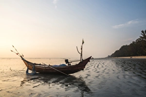 Typically Myanmar Prints: Fishing boat on Maungmagan Beach at sunset, Dawei, Tanintharyi Region, Myanmar (Burma)