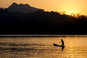 Luang Prabang Prints: Fishing boat on Mekong River, Luang Prabang, Laos, Indochina, Southeast Asia, Asia