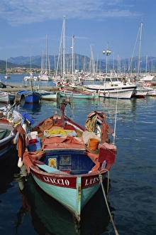 Corsica Prints: Fishing boat moored in the harbour at Ajaccio, island of Corsica, France