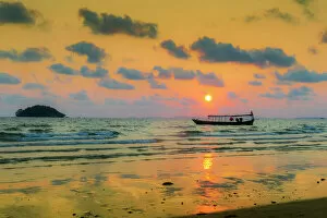 Cambodia Gallery: Fishing boat moored off beach south of the city at sunset, Otres Beach, Sihanoukville