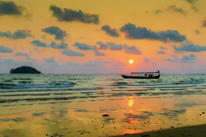 Oceans Gallery: Fishing boat moored off beach south of the city at sunset, Otres Beach, Sihanoukville