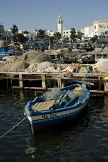 Images Dated 3rd October 2008: Fishing boat and mosque, Mahdia, Tunisia, North Africa, Africa