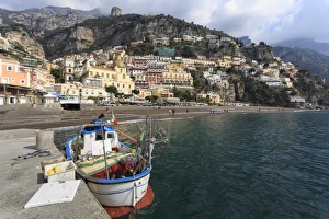 Fishing boat at quayside and Positano town, Costiera Amalfitana (Amalfi Coast), UNESCO