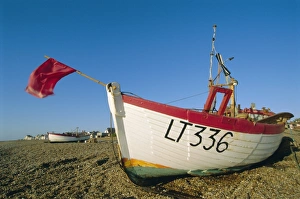Aldeburgh Prints: Fishing boat with red flag on the beach, Aldeburgh, Suffolk, England, UK, Europe