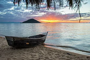 Malawi Prints: Fishing boat at sunset at Cape Malcear, Lake Malawi, Malawi, Africa