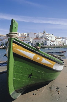 Fishing boat and village near Portimac