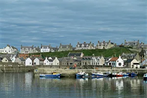 Fishing boats with creels at anchor in harbour at Findochty