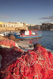 Fishing Nets Prints: Fishing boats and fishing net at the port