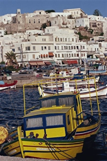 Naxos Prints: Fishing boats in the harbour with town in the background