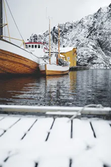 Nordland Gallery: Fishing boats moored in the harbor in the cold Arctic sea, Nusfjord, Nordland county