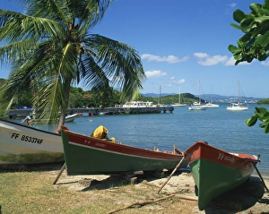 Martinique Prints: Fishing boats pulled up onto the beach at Trois Ilets Harbour