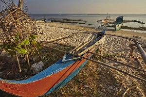 Subsistence Prints: Fishing boats pulled up onto Paliton beach, Siquijor, Philippines, Southeast Asia, Asia