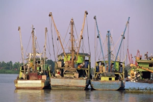 Kuching Prints: Fishing boats on the Sarawak River waterfront in Kuching