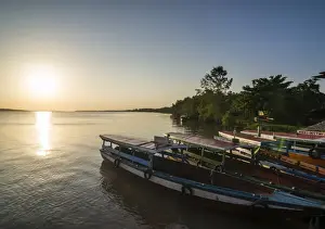 Industrial Prints: Fishing boats at sunset on the Suriname River near Paramaribo, Surinam, South America
