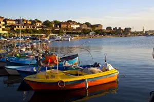 Black Sea Prints: Fishing boats and view towards ramparts and ruins of the medieval fortification walls