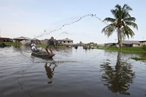 Fishing in Ganvie lake village on Nokoue Lake, Benin, West Africa, Africa