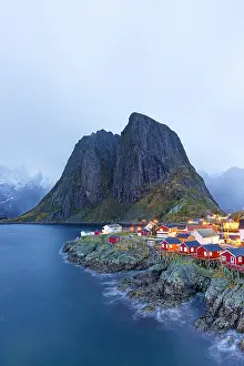 Quaint Prints: Fishing huts in Hamnoy along the coast of Lofoten Islands during twilight hours