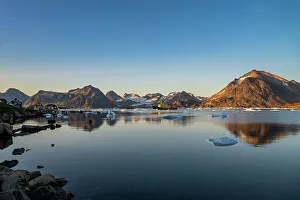 Rugged Terrain Prints: Fishing trawler in the mountainous fjord, Kulusuk, Greenland, Denmark, Polar Regions