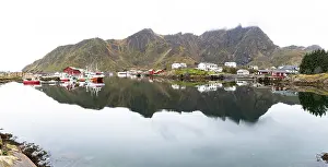 Fishing Village Prints: Fishing village of Ballstad and mountains mirrored in the calm waters of a fjord