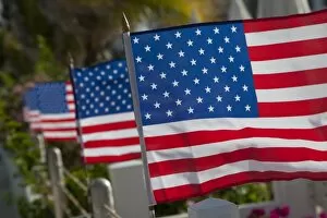 Images Dated 28th May 2009: US flags attached to a fence in Key West, Florida, United States of America