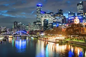High Rises Prints: Flinders Street Station bank of Yarra River in City of Melbourne at twillight