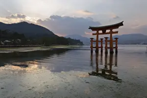The floating Miyajima torii gate of Itsukushima Shrine at sunset, UNESCO World Heritage Site