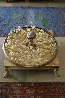 Ahmedabad Prints: Flower arrangement in traditional brass thali