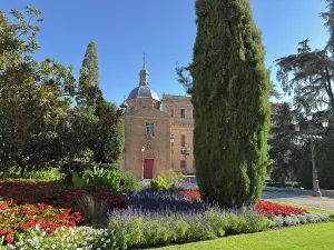 Enjoyment Prints: Flowers and trees surround the Church of San Sebastian in Salamanca