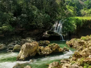Relaxing Prints: Flowing water at Cahabon River with waterfalls in Guatemala