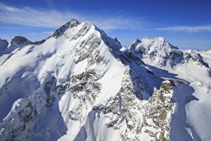 Mountainside Prints: Flying over Piz Bernina and Piz Roseg in winter, Engadine, Switzerland, Europe