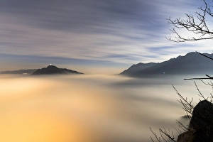 Province Of Lecco Prints: Fog and clouds at dawn seen from Monte San Martino, Province of Lecco, Lombardy, Italy