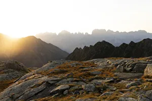 Foggy sunrise over Brenta Dolomites viewed from Rifugio Cornisello Foggy sunrise over Brenta Dolomites viewed from Rifugio Cornisello