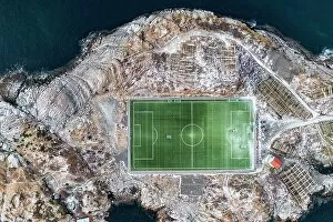 Nordland County Gallery: Football field on islet from above, aerial view, Henningsvaer, Nordland county, Lofoten Islands