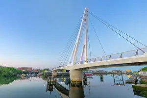 Pedestrians Prints: Footbridge connects Govan and Partick over the River Clyde in Glasgow during early evening