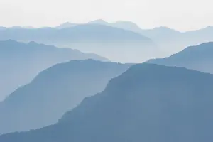 Bhutan Prints: Foothills of the Himalayas in east Bhutan take on an ethereal appearance in early morning mist
