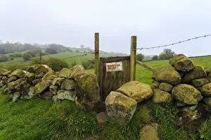 Access Prints: Footpath gate and dry stone wall near Elton on a murky spring day