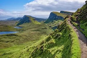 Footpath Prints: Footpath winding through hills of Trotternish escarpment in Isle of Skye Scotland
