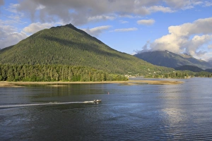 Sitka Prints: Forested mountains and small boat, from Sitka Sound, rare evening sun, summer, Sitka