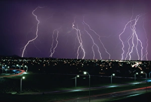 Images Dated 29th January 2000: Fork lightning at night over a city