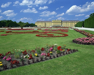 Formal gardens with flower beds in front of the Schonbrunn Palace, UNESCO World Heritage Site