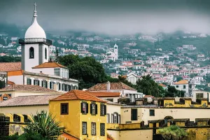 Relax Prints: Forte de So Tiago offers a vibrant view of colourful rooftops and historic buildings in Funchal