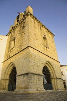 Images Dated 23rd August 2009: The fortress like stone tower of medieval Faro Cathedral (Largo da Se) in Faro
