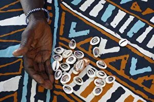 Cloth Prints: Fortune telling with cowrie shells, Saly, Thies, Senegal, West Africa, Africa