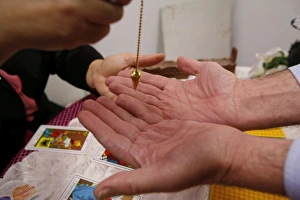 Human Hands Prints: Fortuneteller conducting a divination, Paris, France, Europe