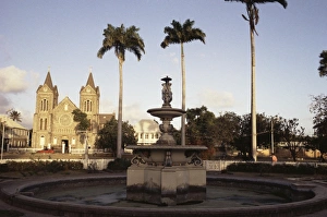 Leeward Island Prints: Fountain and cathedral, Independence Square, Basseterre, St