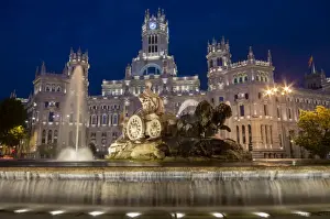 Fountain and Plaza de Cibeles Palace (Palacio de Comunicaciones) at dusk, Plaza de Cibeles