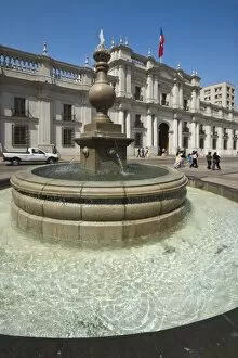 Fountain in the Plaza de La Constitucion and the Palacio de La Moneda, formerly a colonial mint