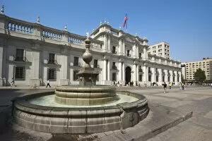 Fountain in the Plaza de La Constitucion and the Palacio de La Moneda, formerly a colonial mint