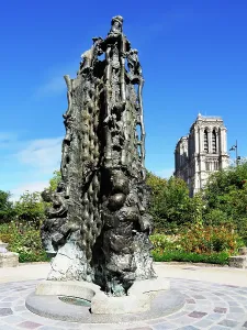 Charm Prints: Fountain of Saint Julien le Pauvre draws visitors and locals in the heart of Paris near famous landmarks