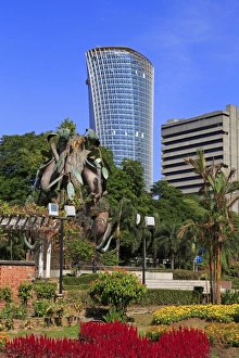 Flower Bed Prints: Fountain Sculpture and JKR Tower, Kuala Lumpur, Malaysia, Southeast Asia, Asia